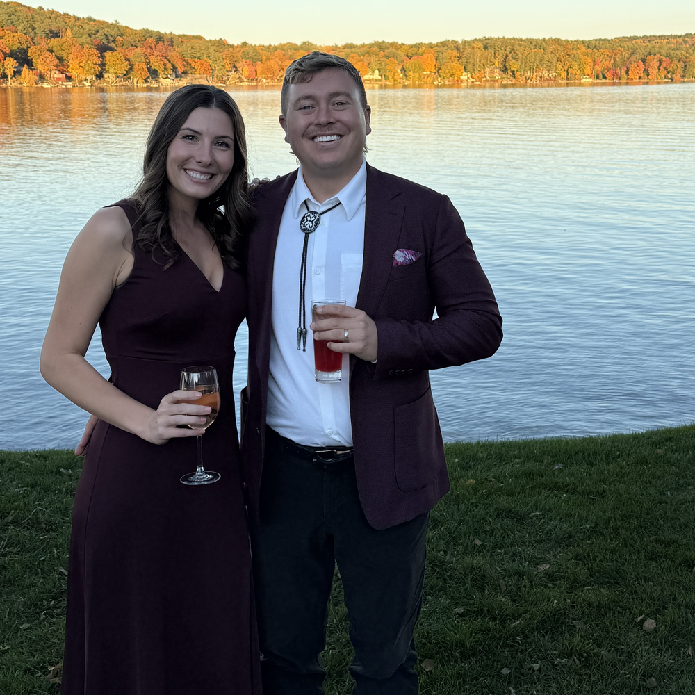 Andy Mewborn and his wife by the lake